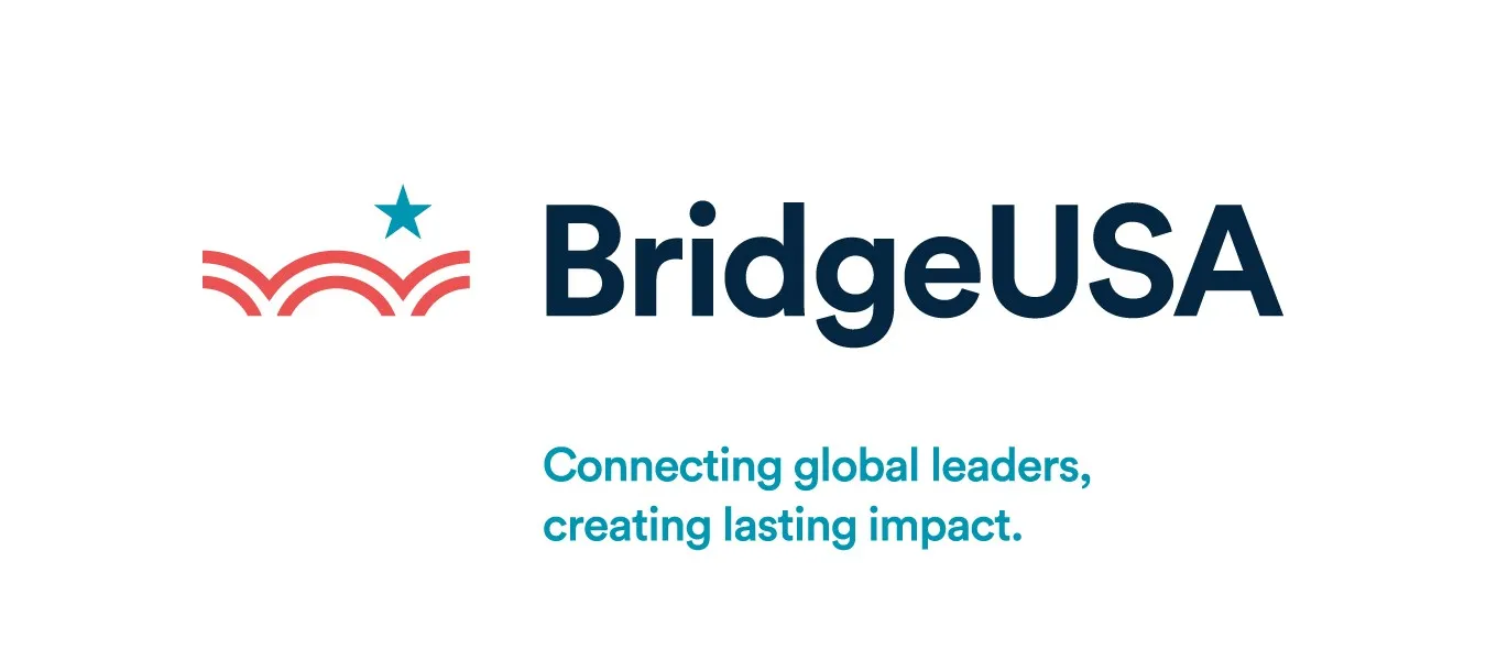 Logo BridgeUSA. Connecting global leaders, creating lasting impact.